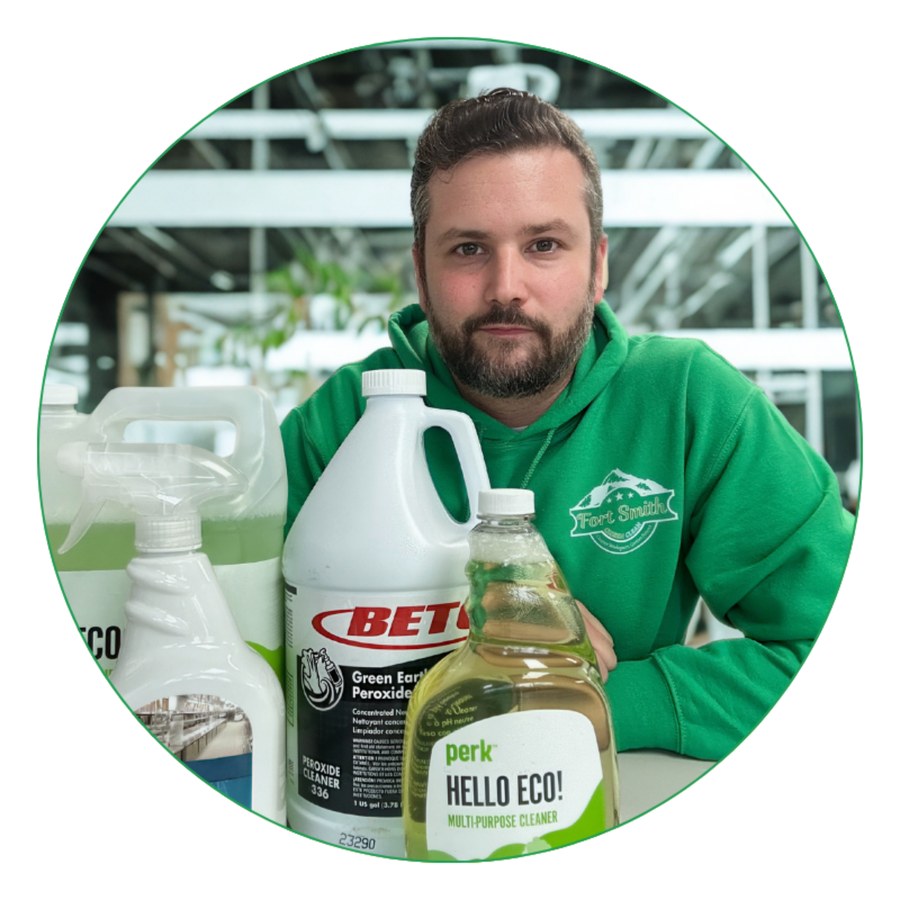 Fort Smith Green Clean owner with cleaning products
