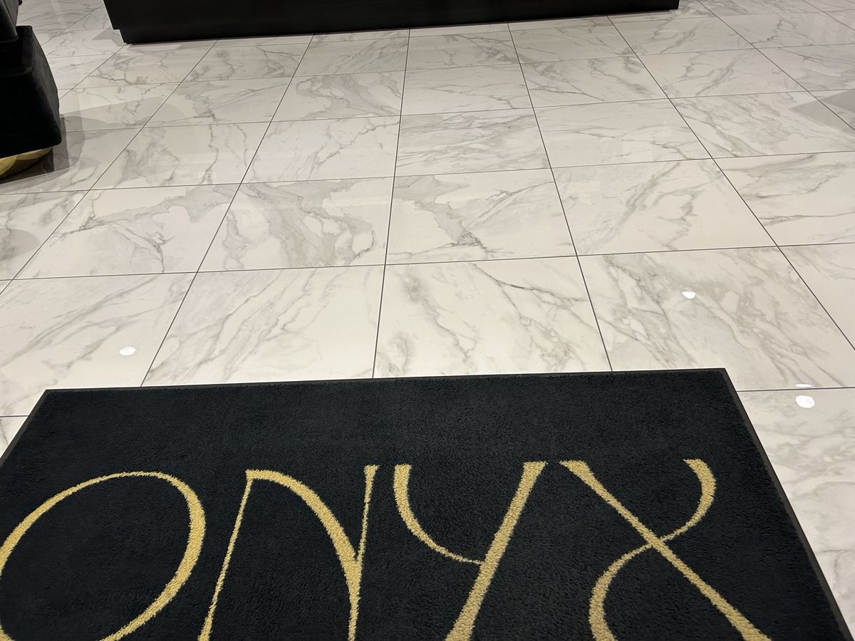 Entry mat and clean tile floor at a commercial business