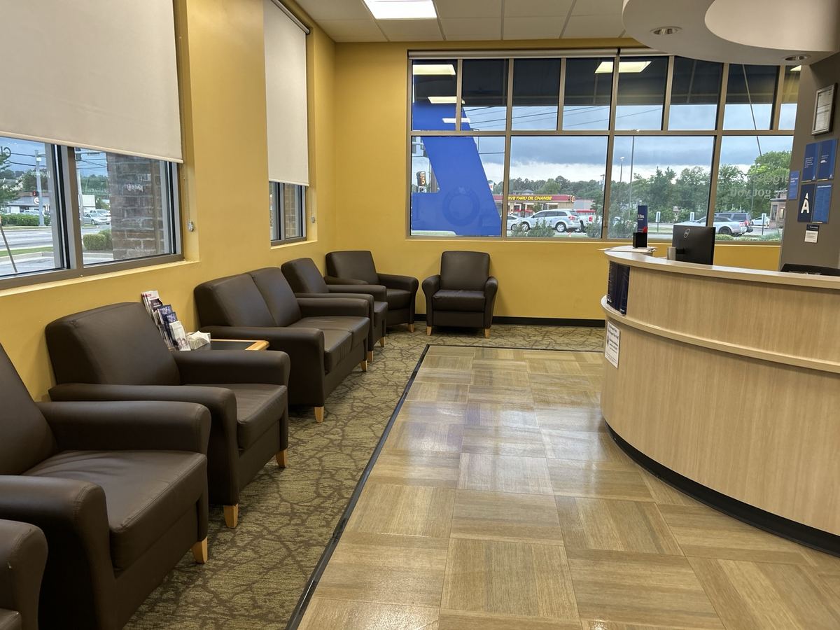 Clean commercial waiting room with polished floor